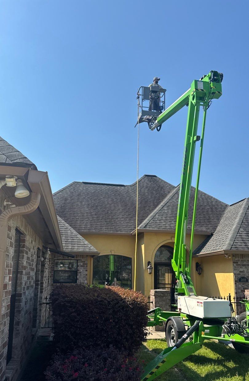 Acadiana Roof Restoration crew on a residential job site in Lafayette, Louisiana